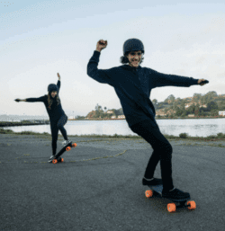 two people skateboarding